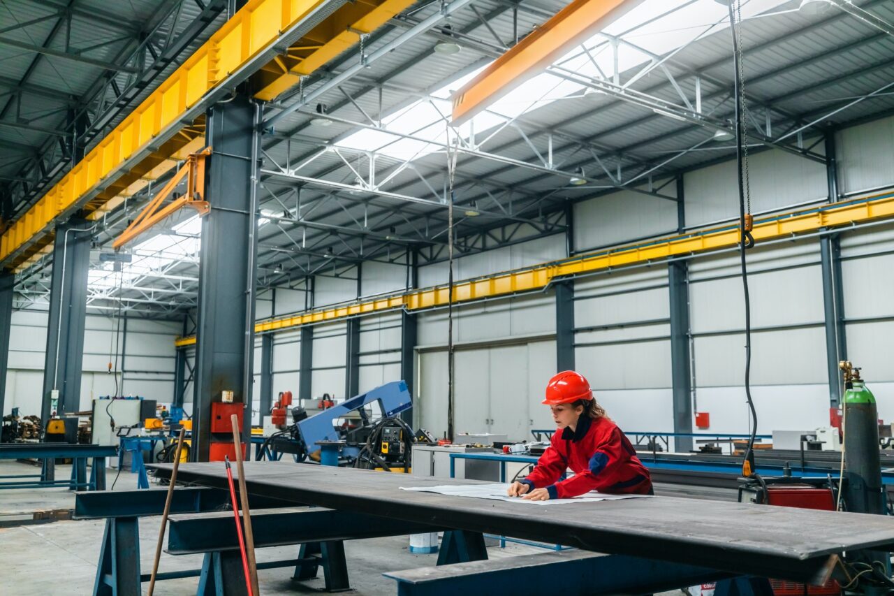 engineer-working-at-industrial-building-e1701435562942.jpg